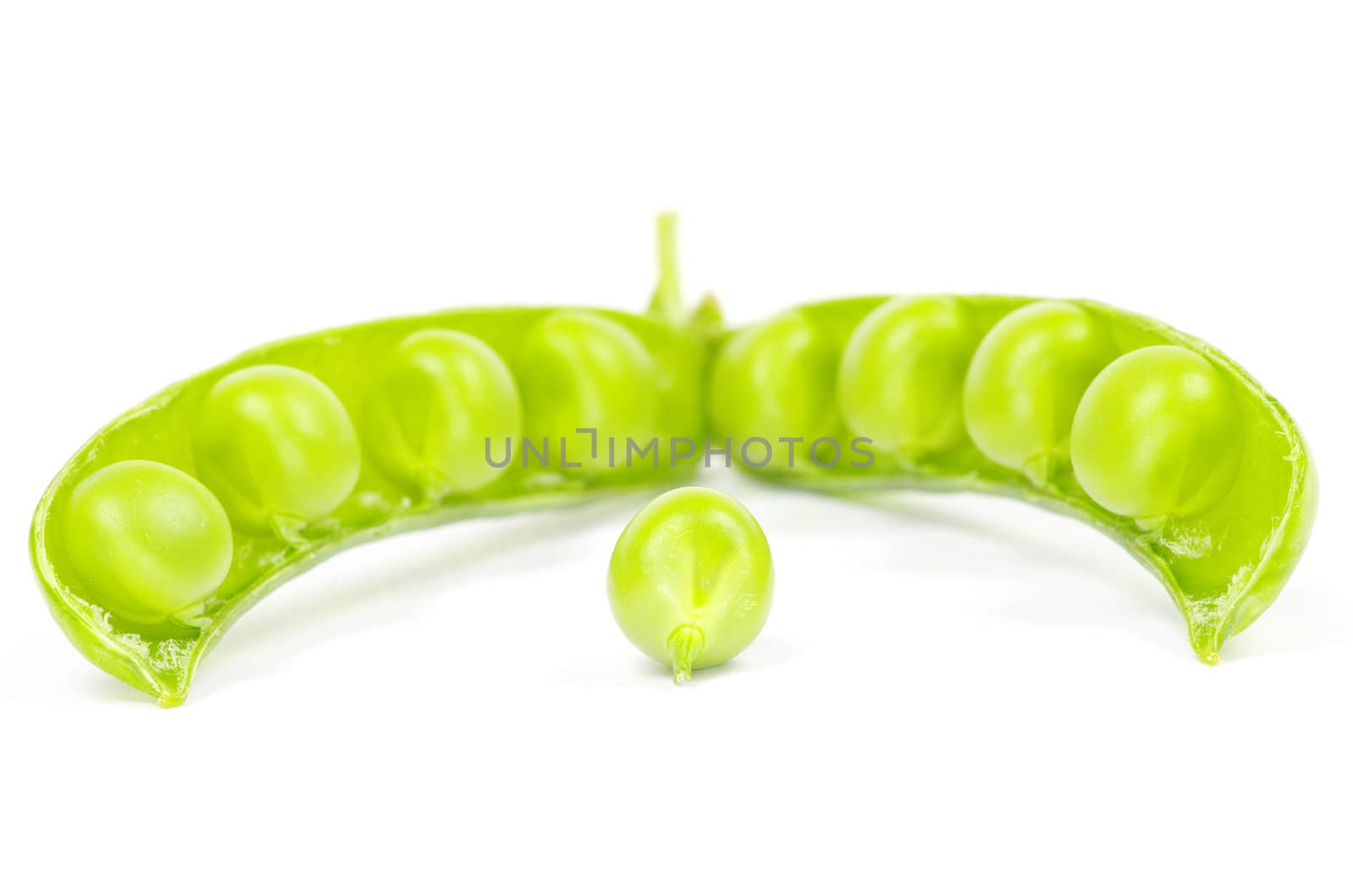 fresh green peas isolated on a white background