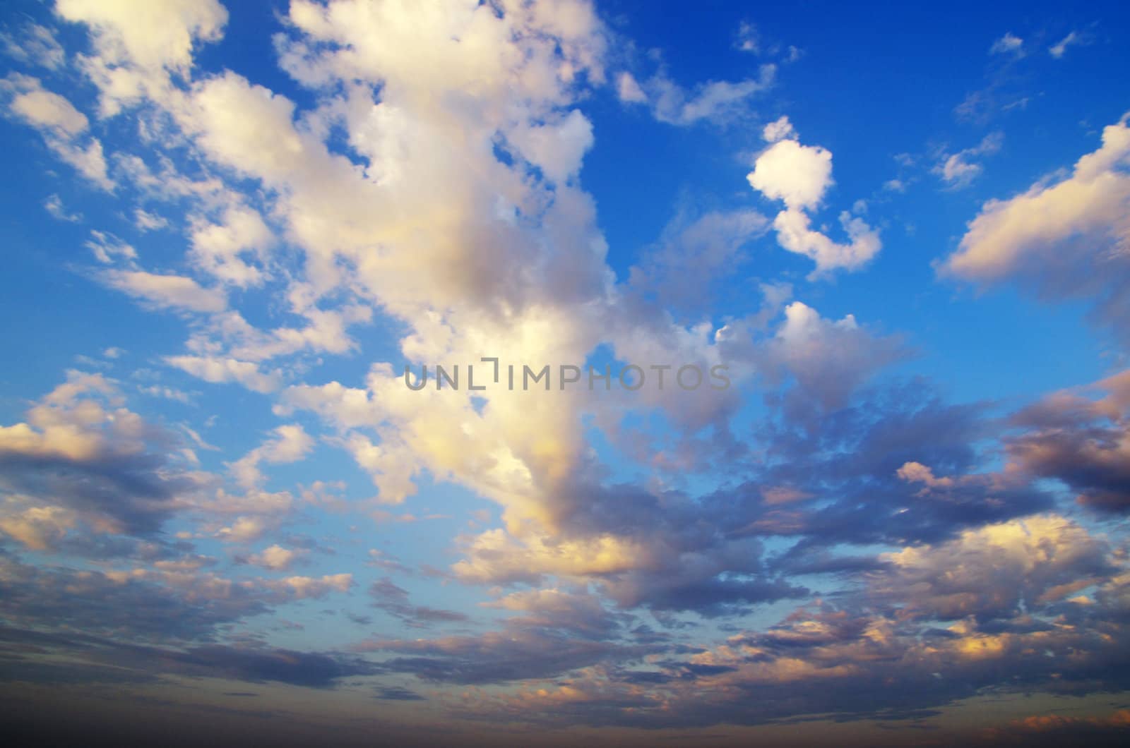 blue sky background with tiny clouds