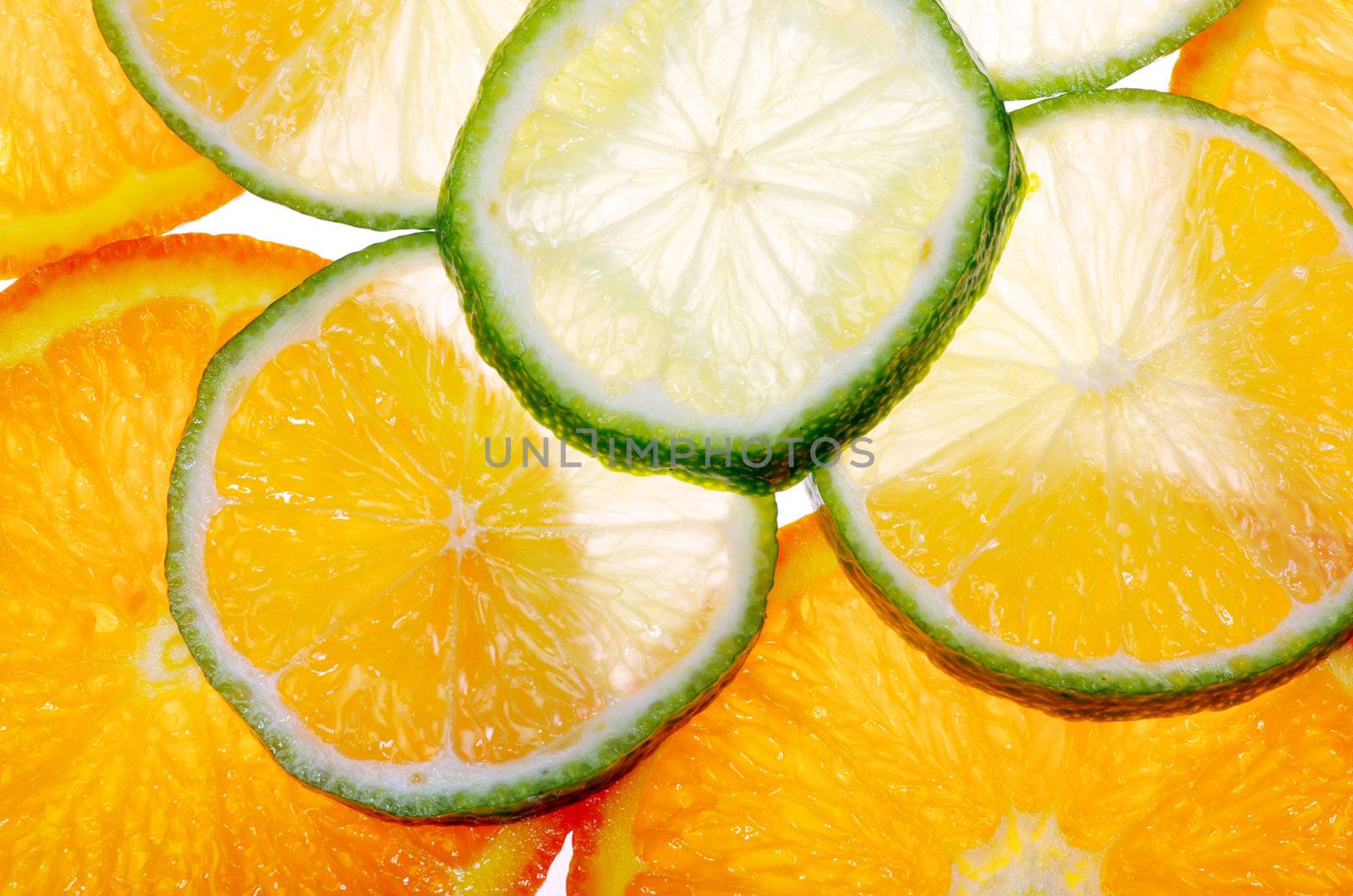 Mixed sliced citrus fruit background