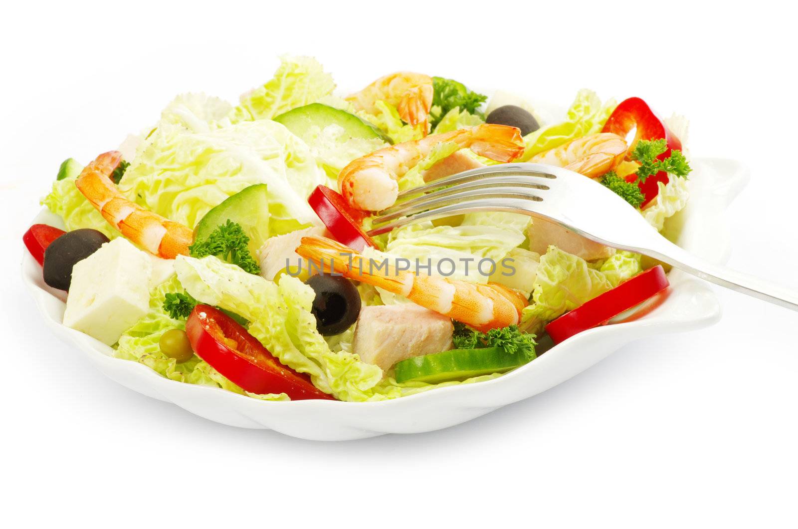vegetable salad in plate on white