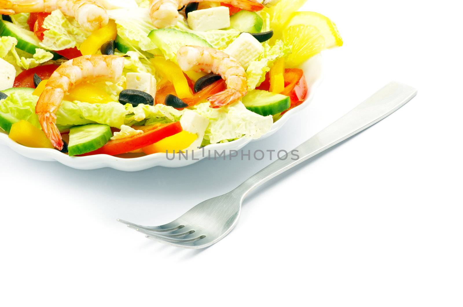 vegetable salad in plate on white