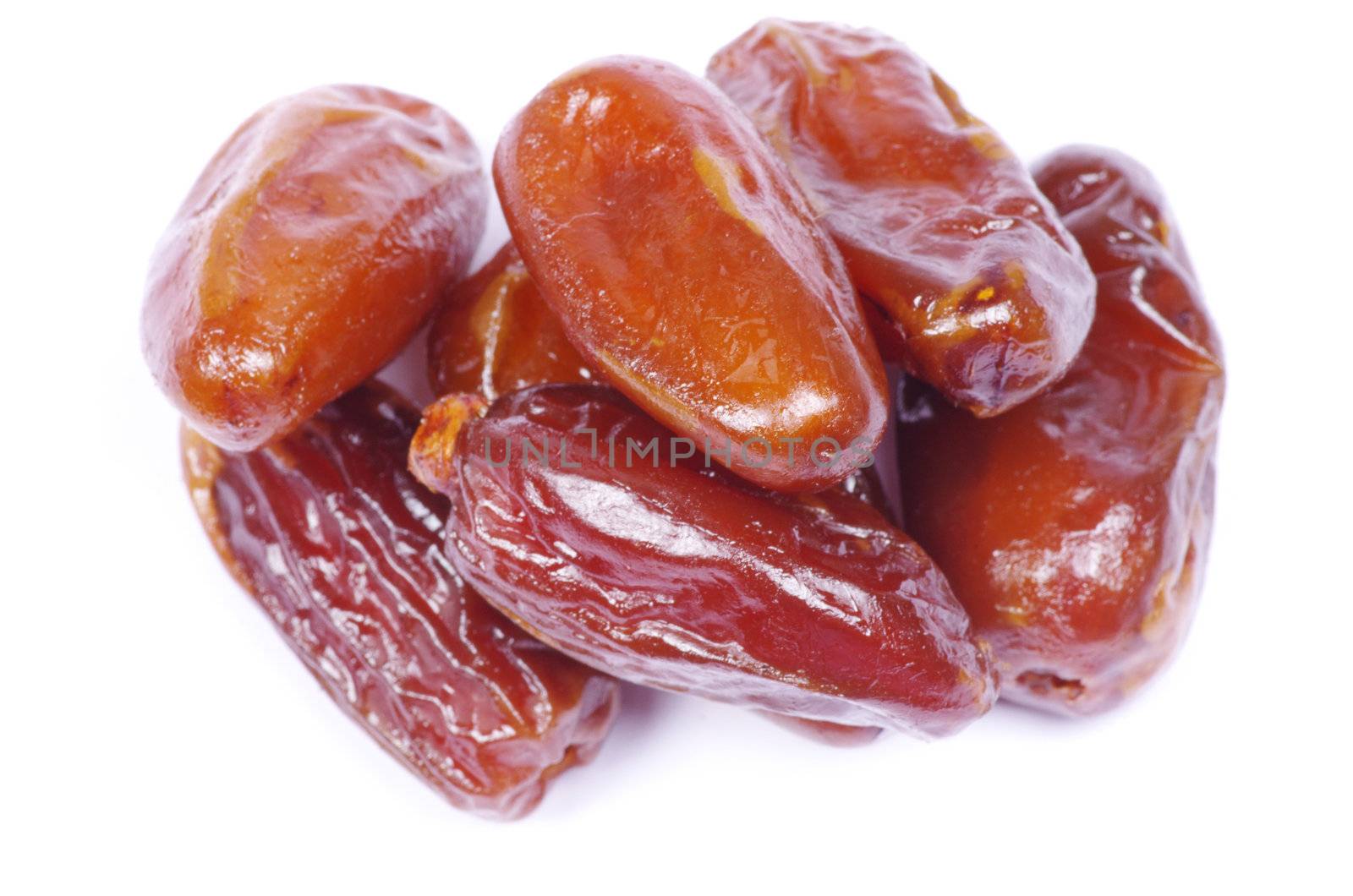 dryed dates on white background