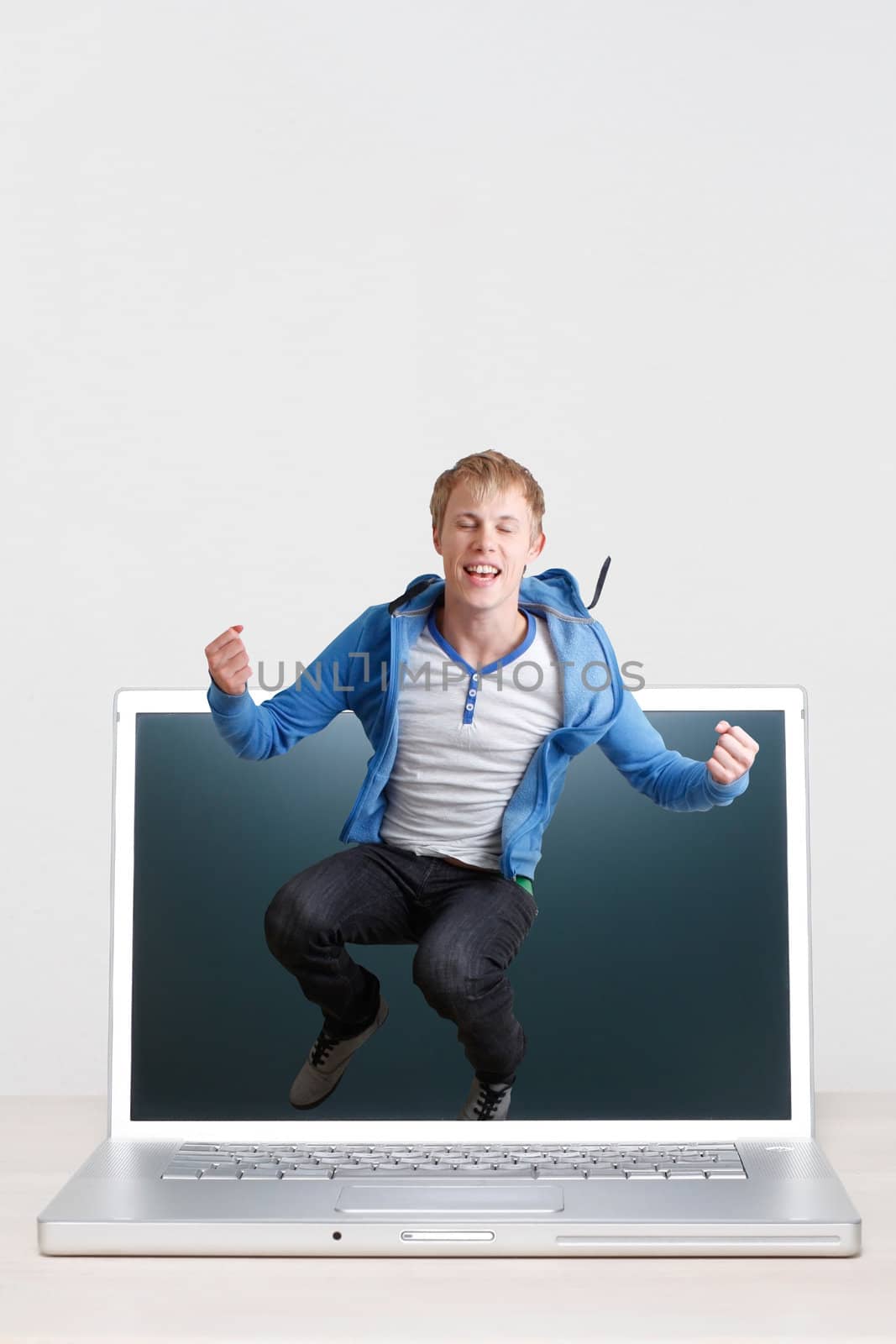 A teenager jumping off a screen