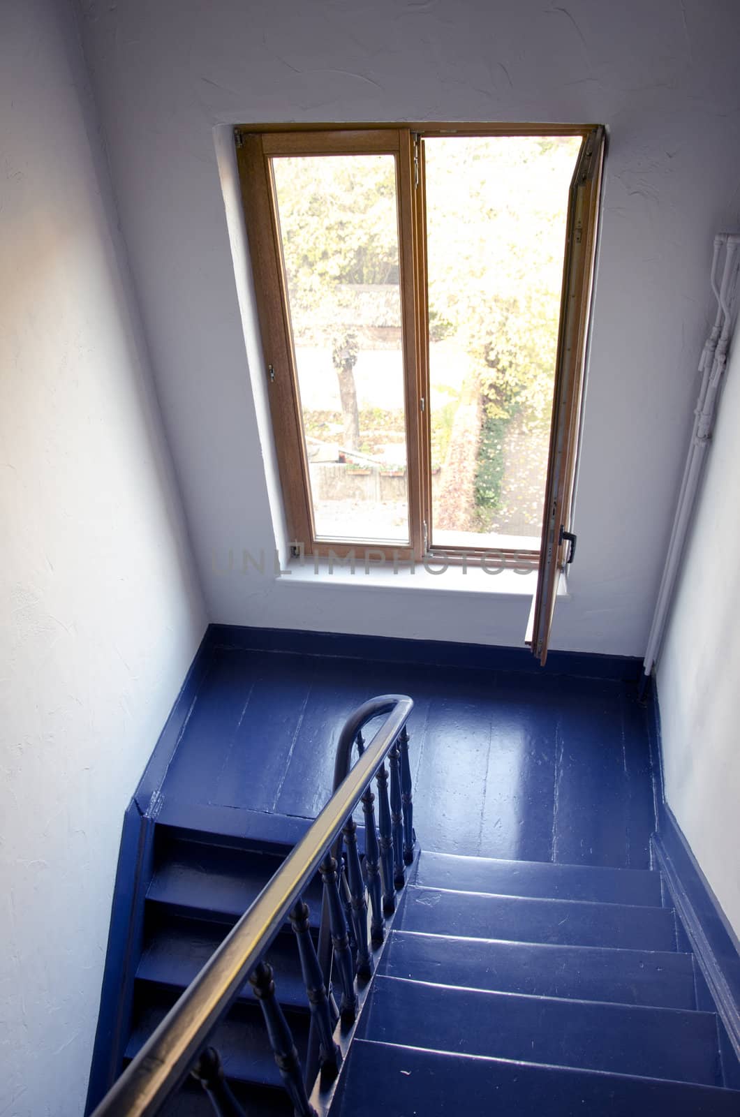 blue staircase and window in the old house