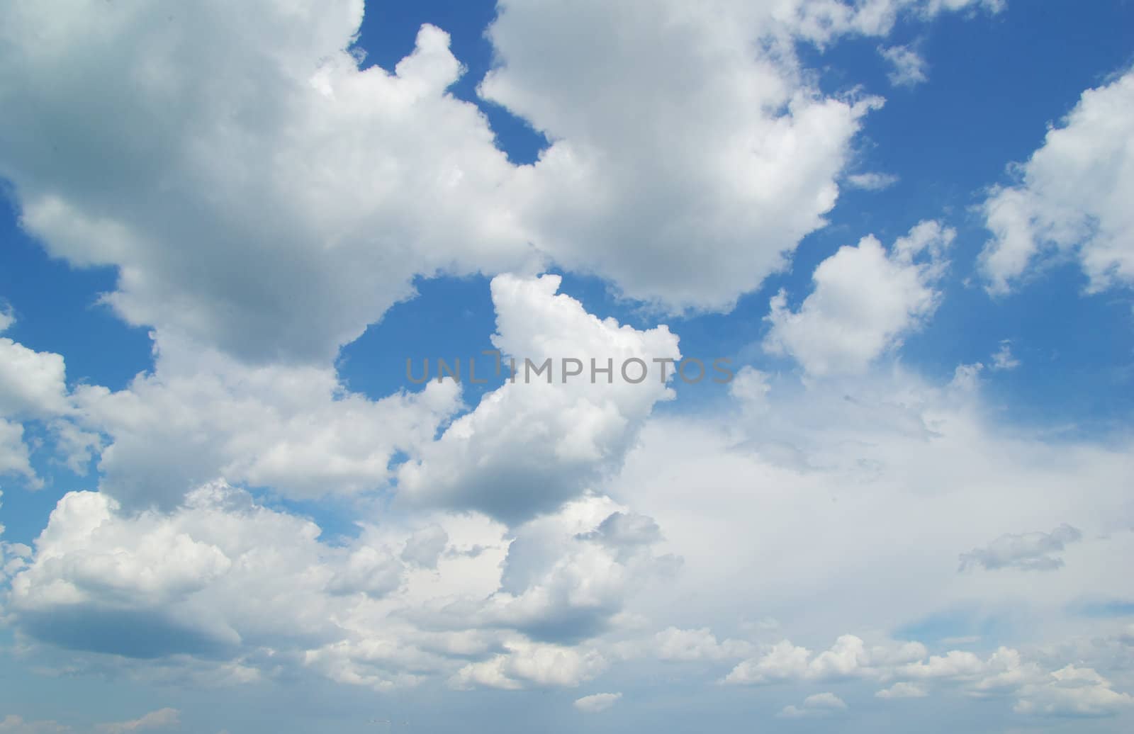 blue sky with clouds and sun