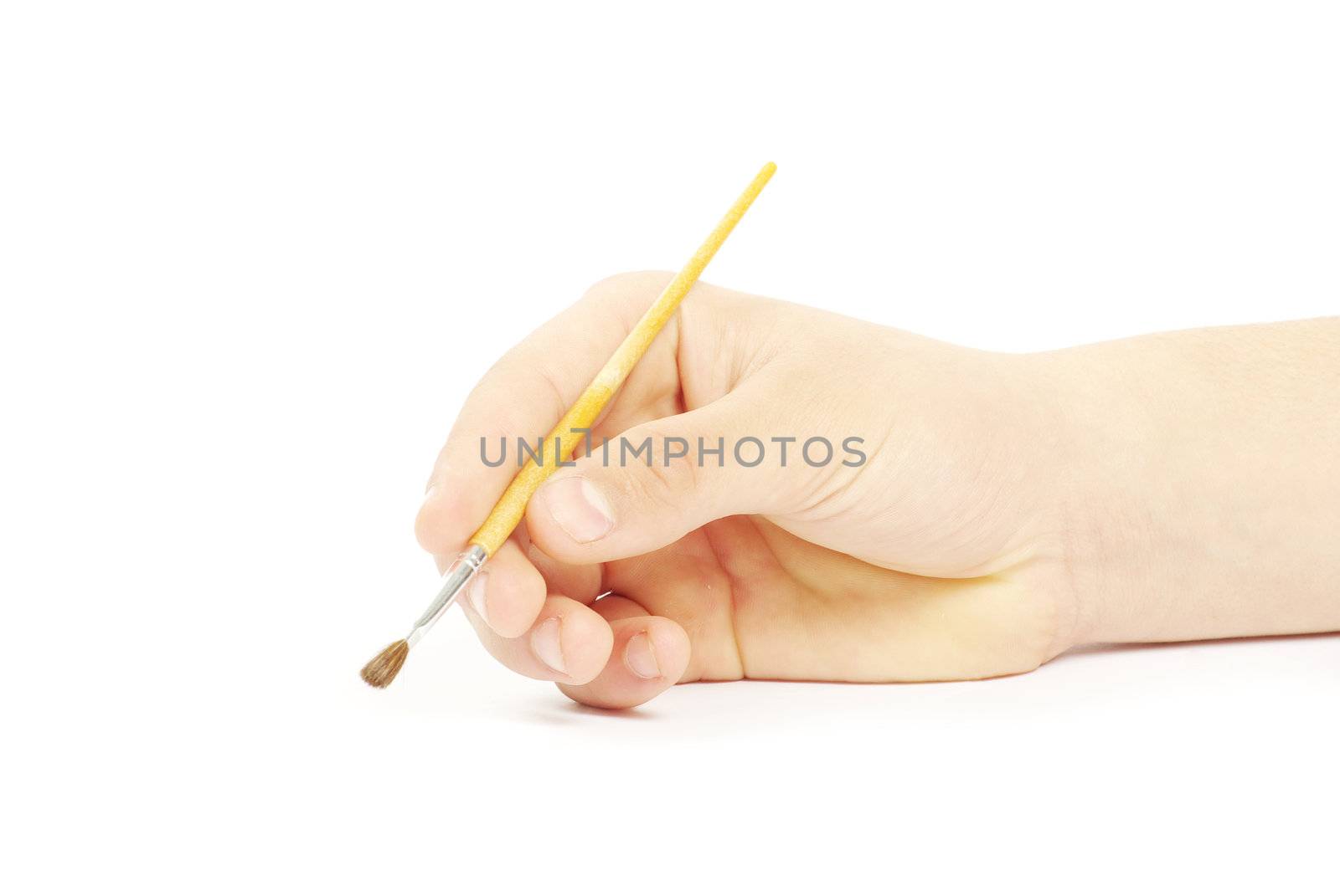 Isolated photo of a brush in a hand