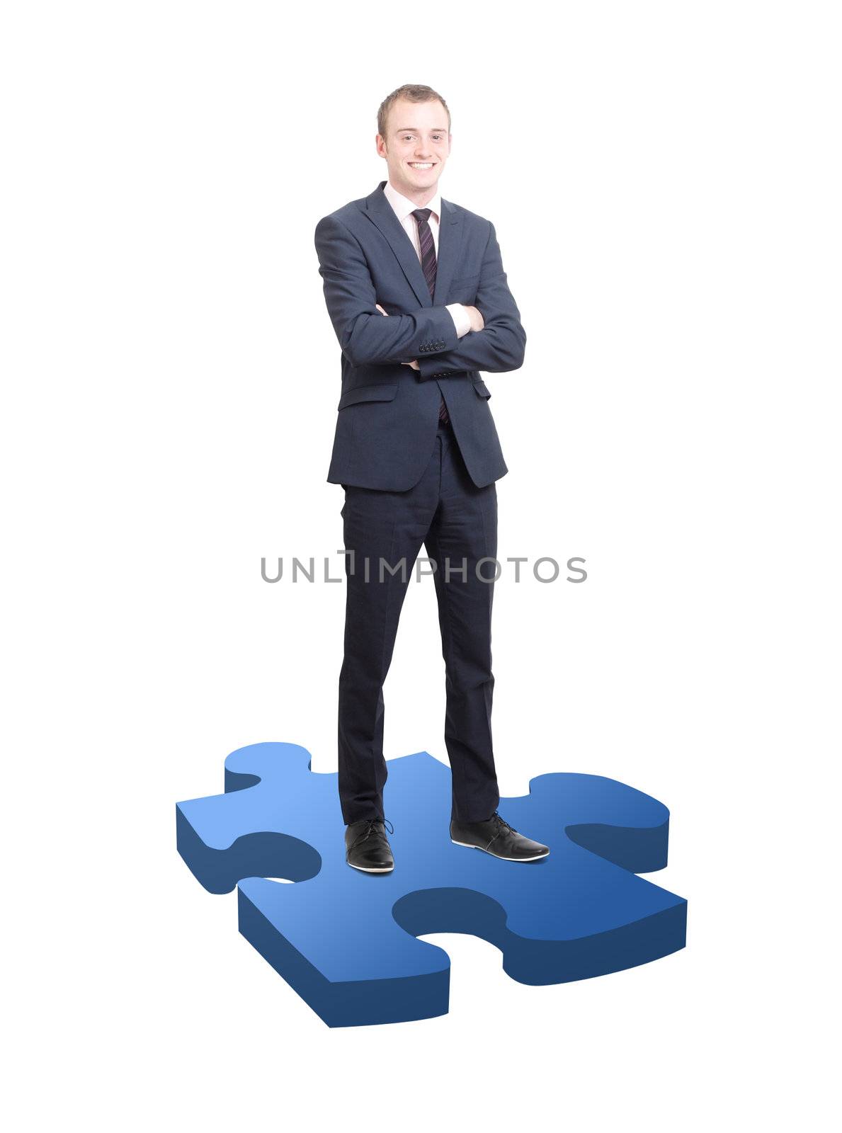 Businessman on puzzle piece by leeser