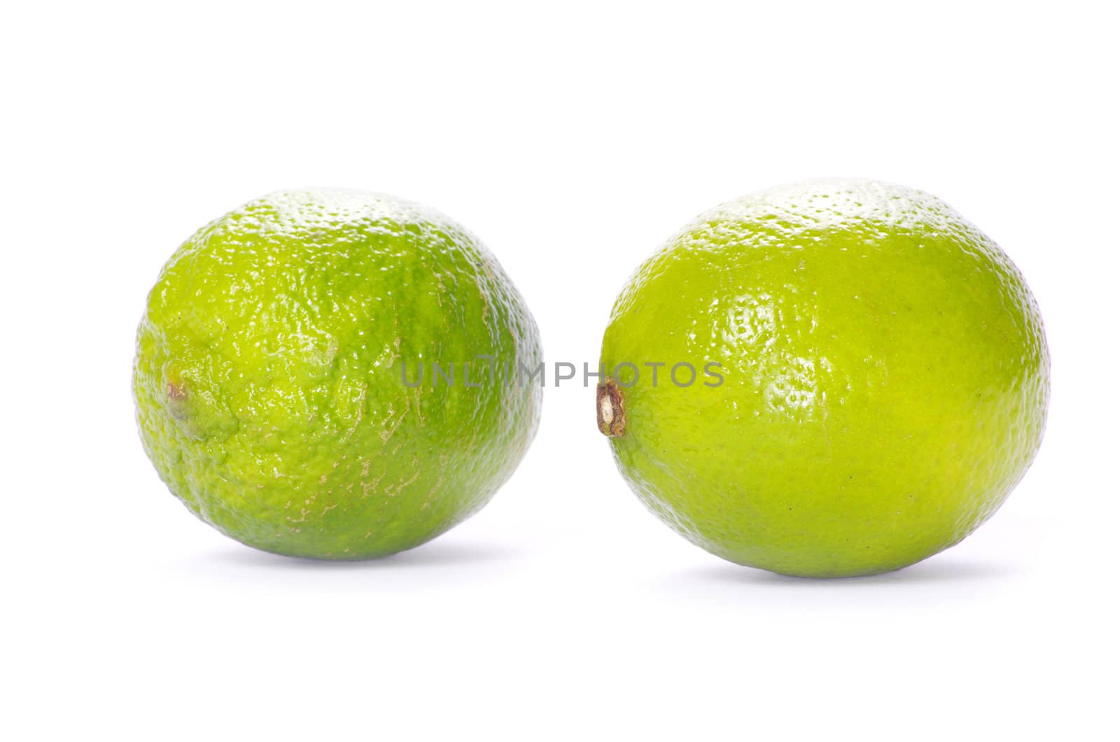 Fresh ripe lime isolated on white background