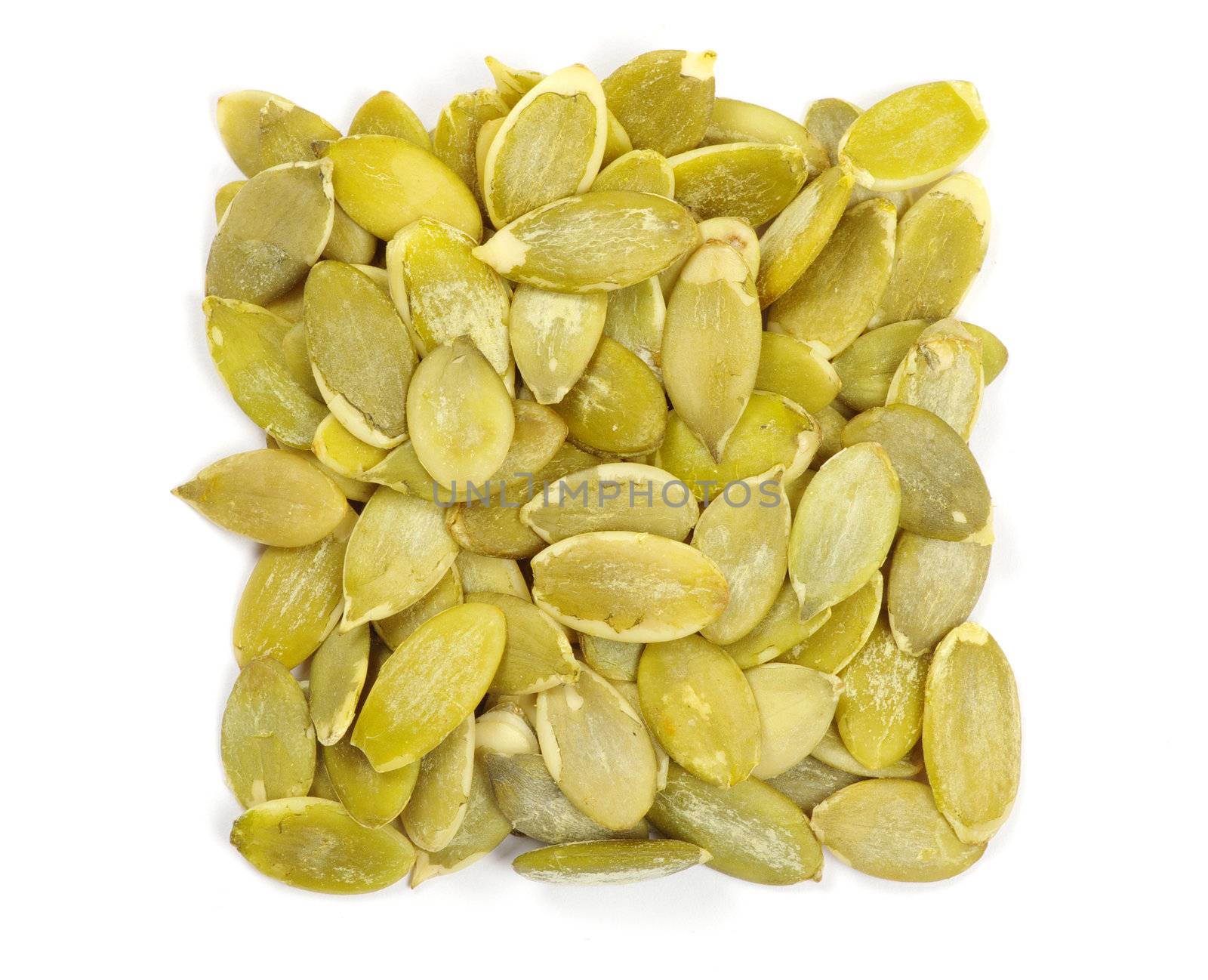 fresh pumpkin seeds isolated on a white