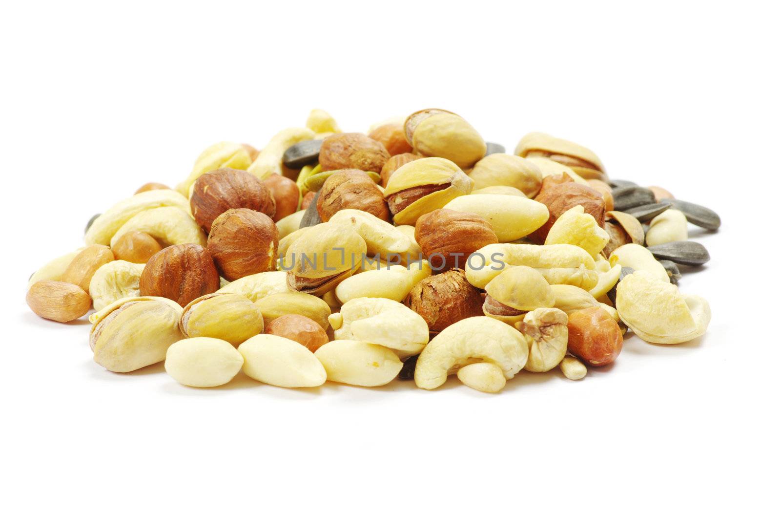 Assorted mixed nuts on white background