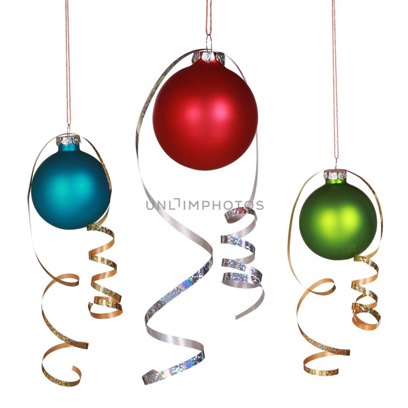 Three Christmas ornaments with gold and silver ribbons isolated on white
