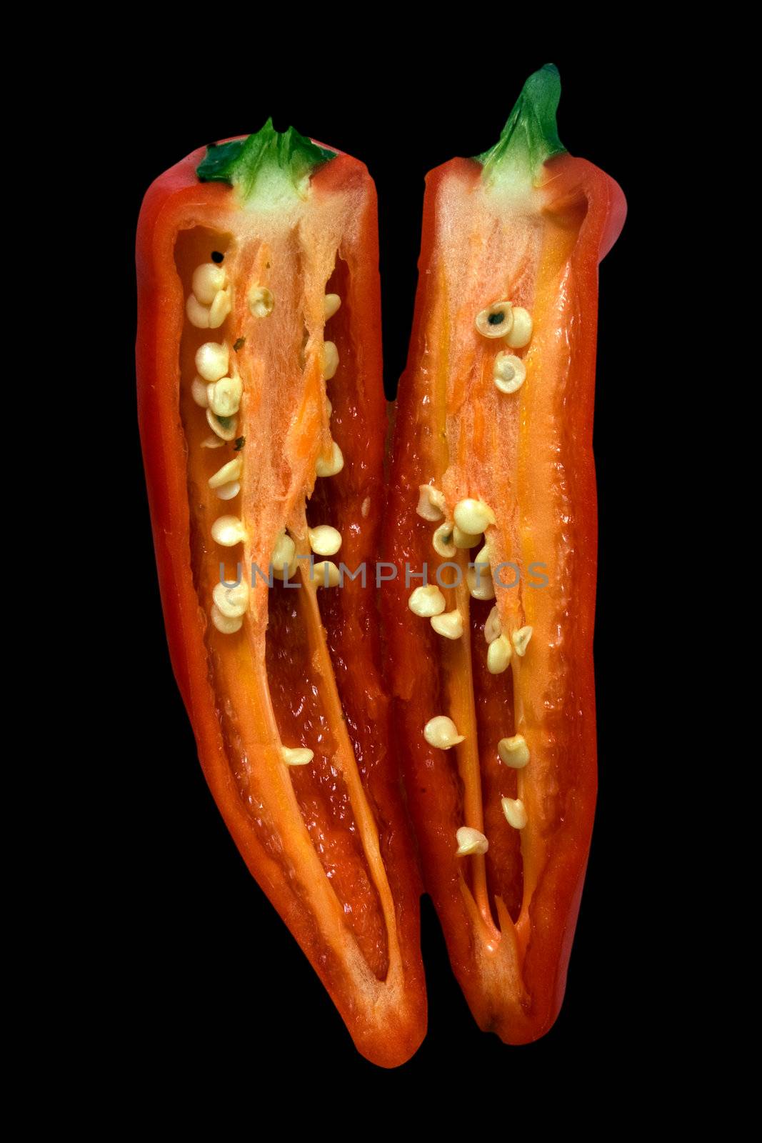 Chilli sliced and isolated on black