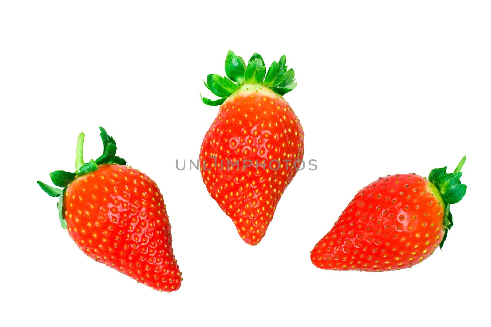 Fresh strawberries over white