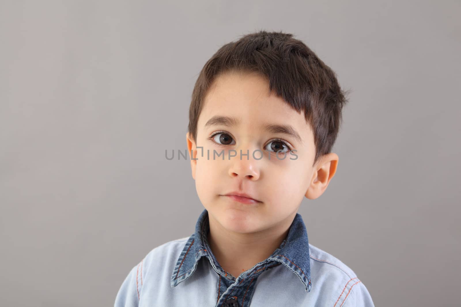 Child portrait isolated in studio