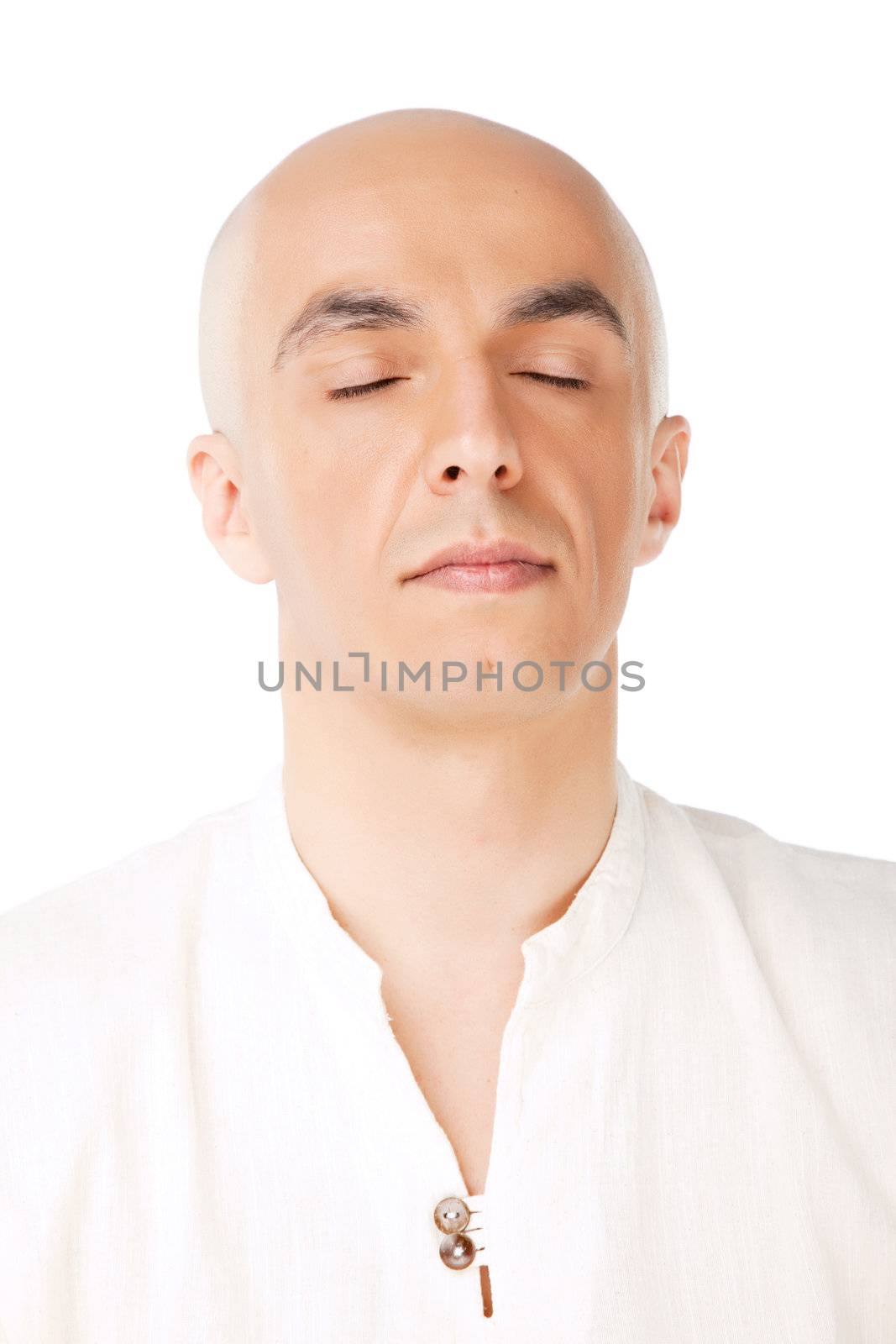 Portait of a bald male meditating isolated, eyes closed