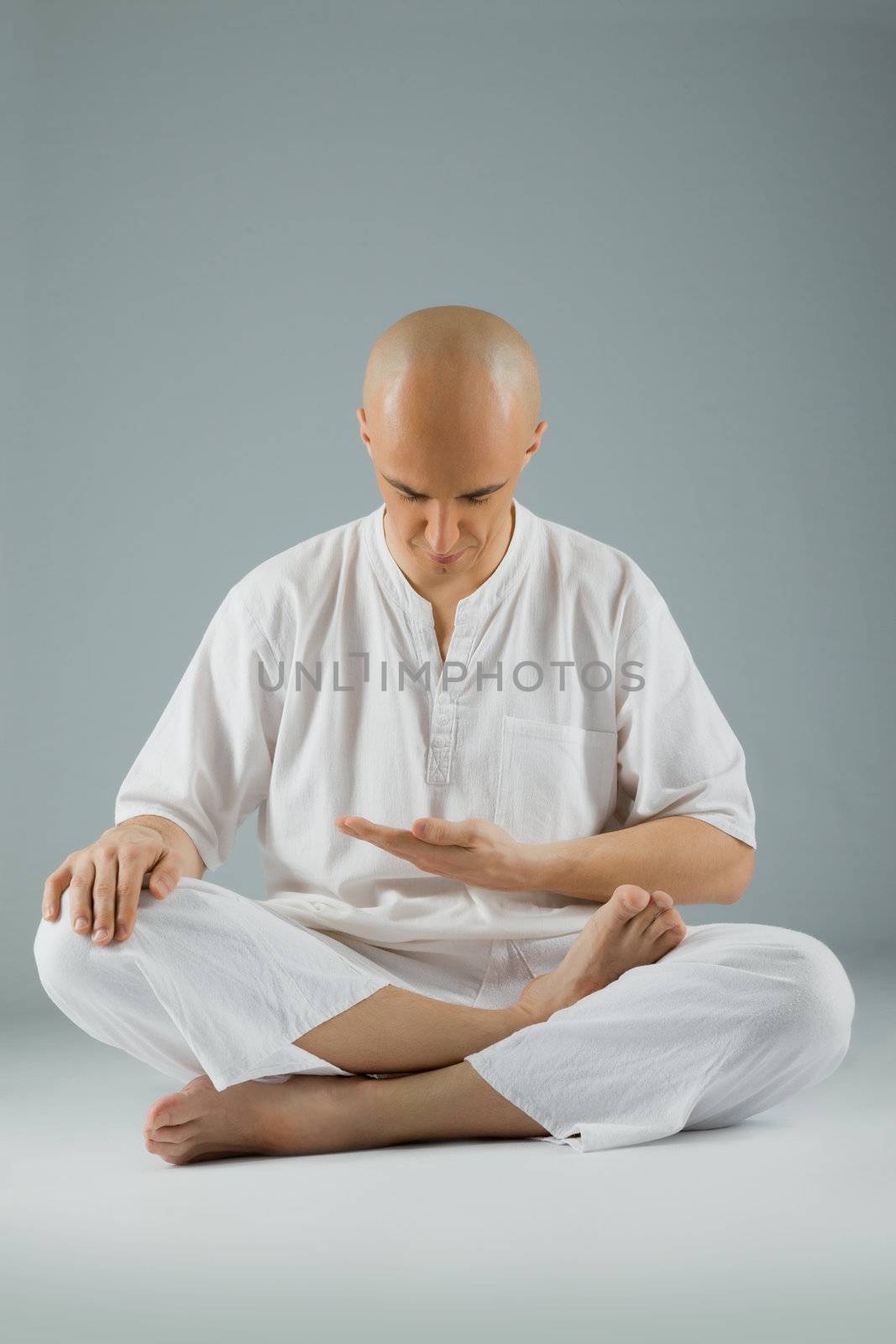 Man meditating by vilevi