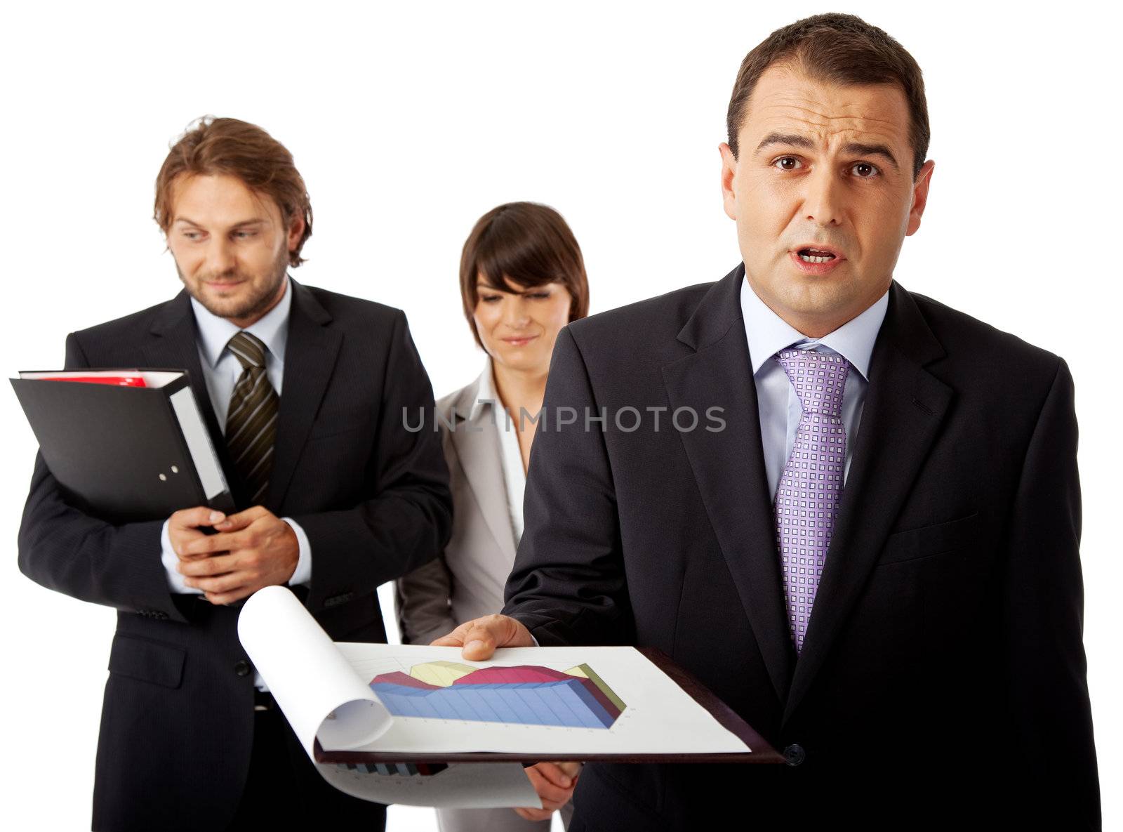 team of three, a male in front is holding graphics and is angry