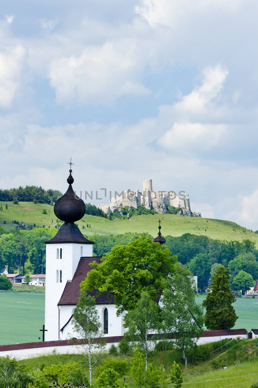 church in Zehra and Spissky Castle at background, Slovakia