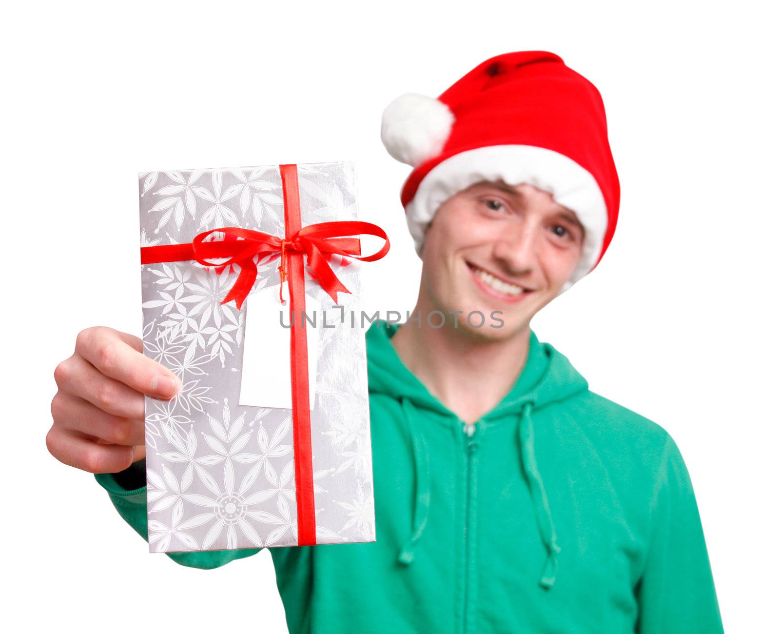 Man with santa hat holding christmas present by leeser