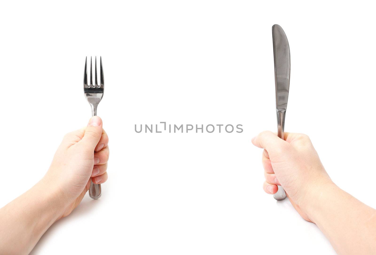 Hands holding knife and fork by leeser
