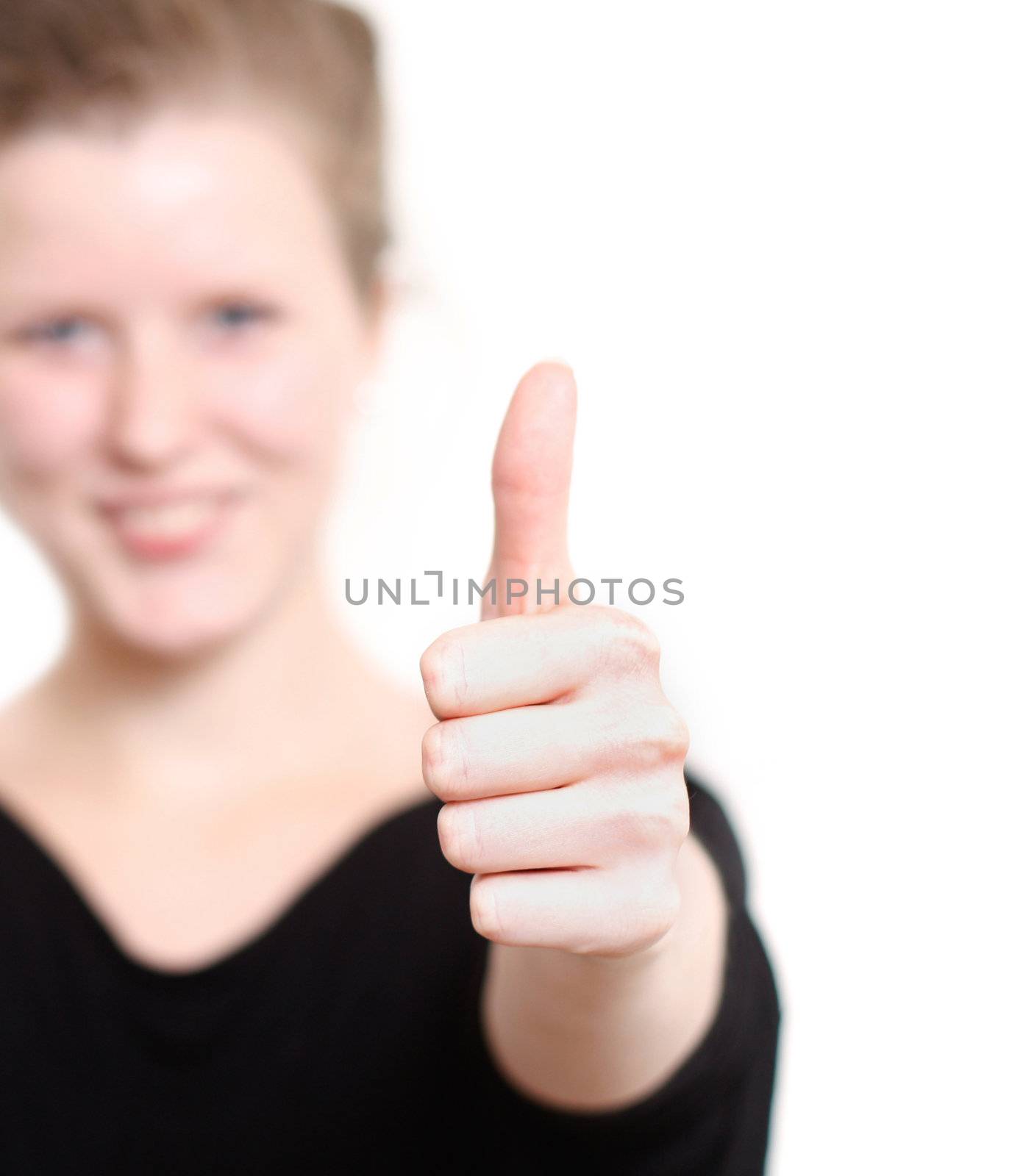 Thumbs up from a young woman