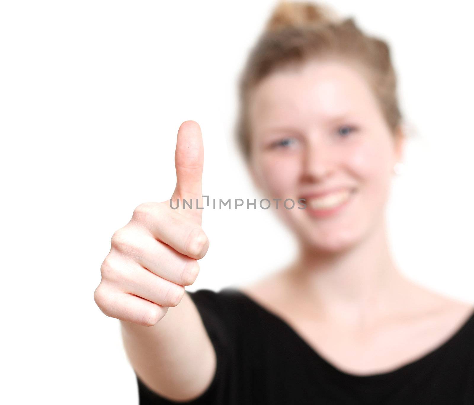 Thumbs up from a young woman