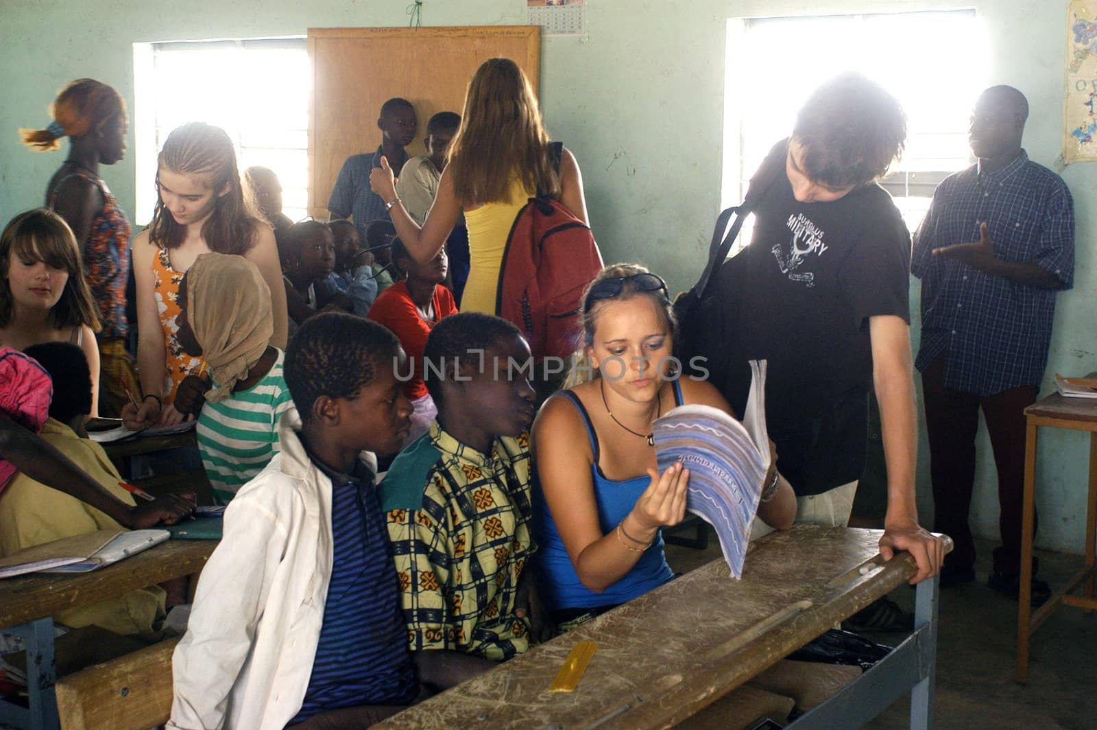 Visit French schoolboys in Burkina Faso Faso in a school of a village. Exchanges are done between the small French and the small Africans for better understanding the differences in life between them.