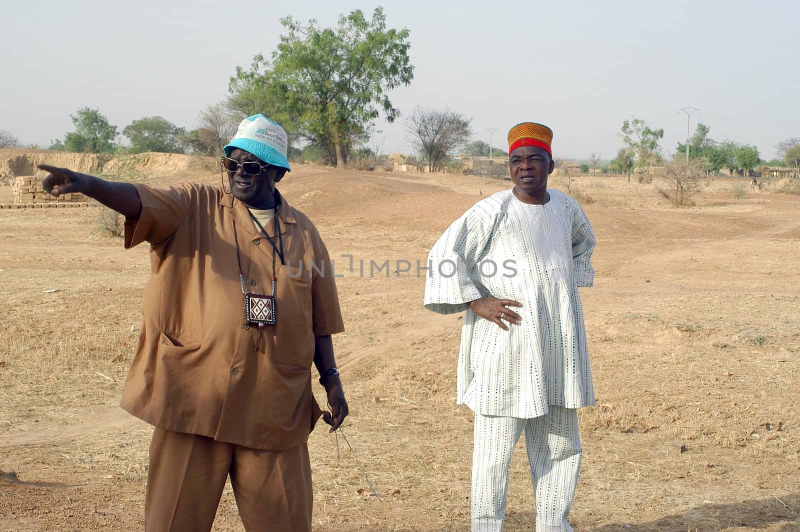 African waterfinder with work in an area of Burkina Faso Faso. Water is not rare in Africa, only it is necessary to drill wells to reach it. The waterfinder thus determines the place exact where to drill because drilling costs 8000 ? and it is not question of missing the place where the machines will have to work.