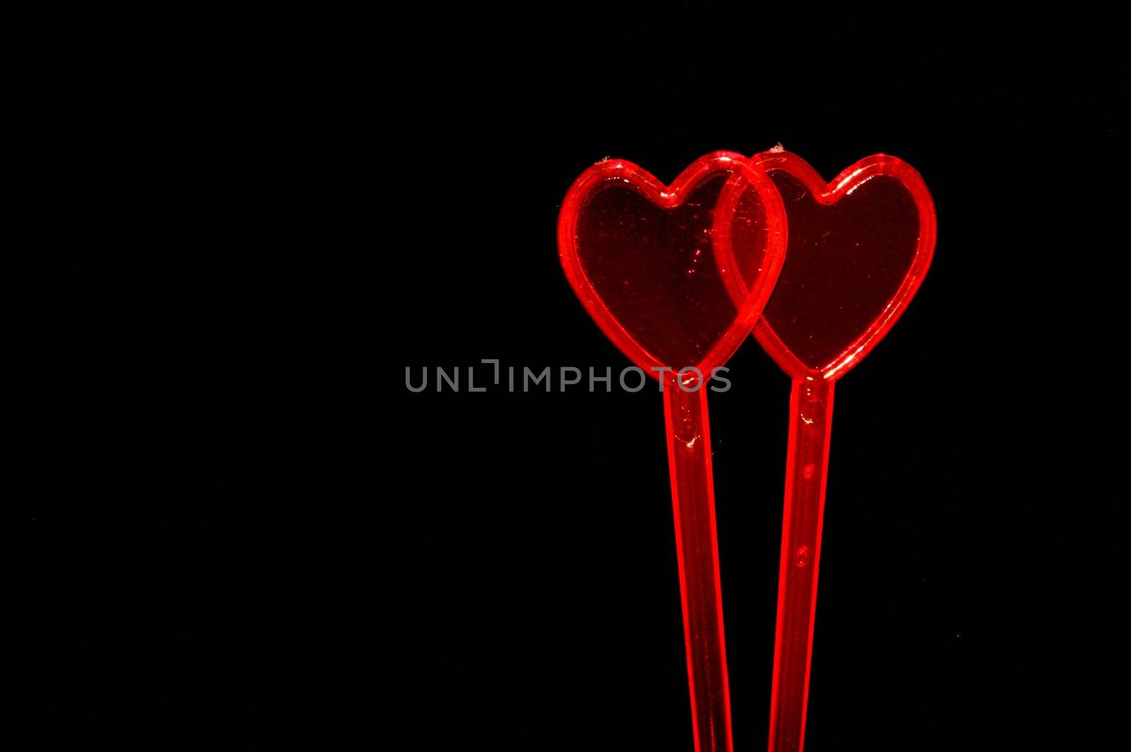 hearts on black background by arnelsr
