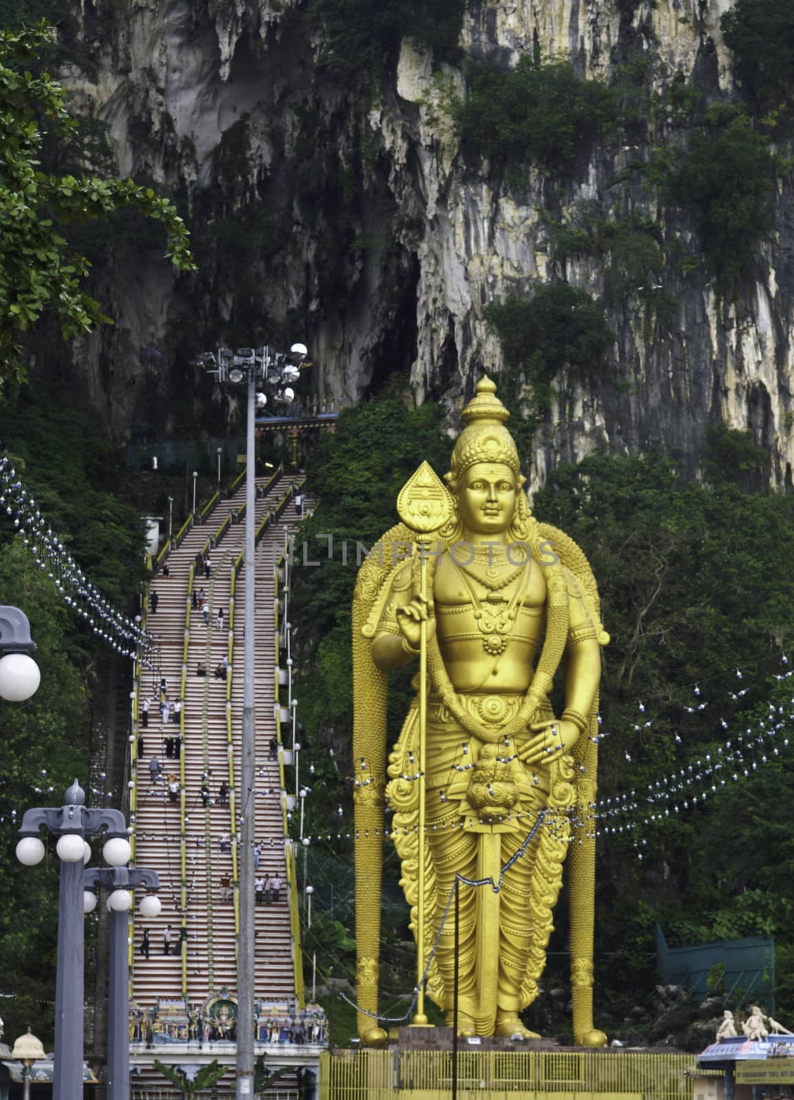 Golden statue in front of Batu caves in Kuala Lumpur, Malaysia