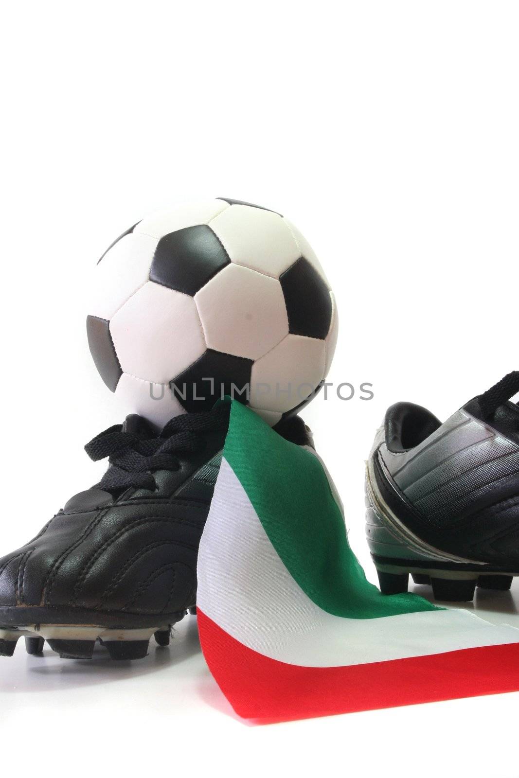 flag of Italy with soccer shoes and football