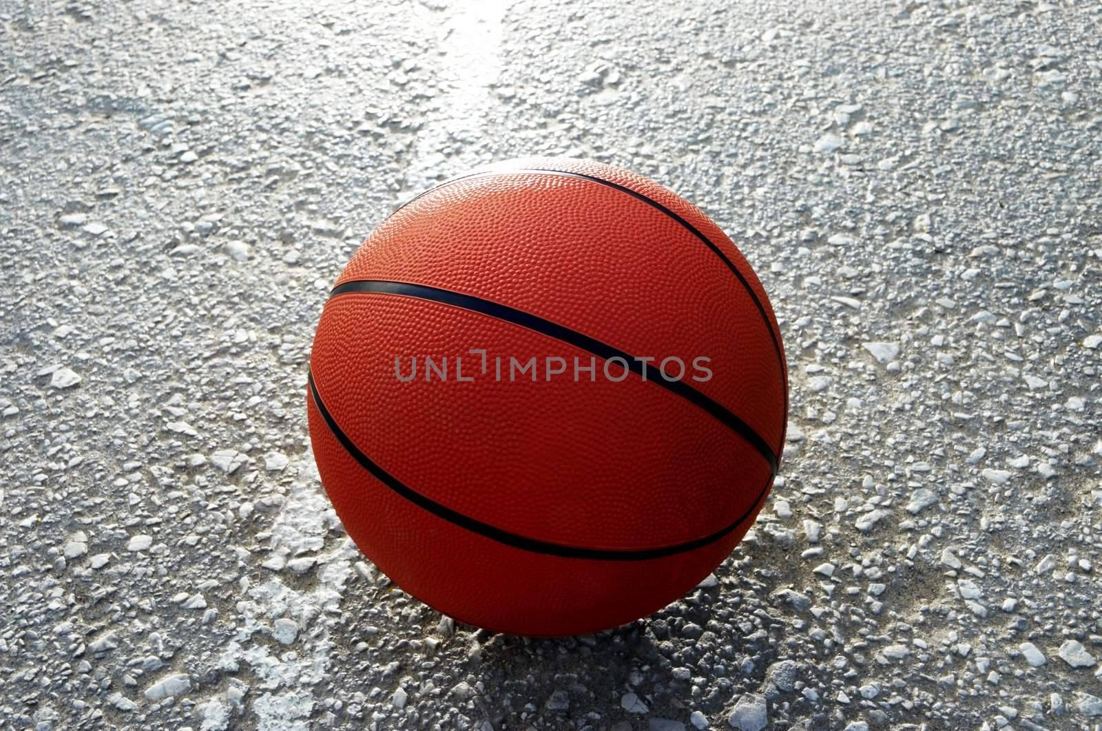 orange basketball by Kuzma