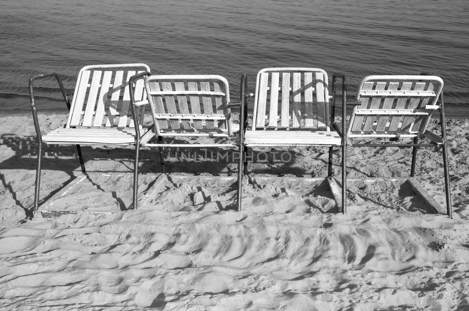 elbow-chairs on the beach by Kuzma