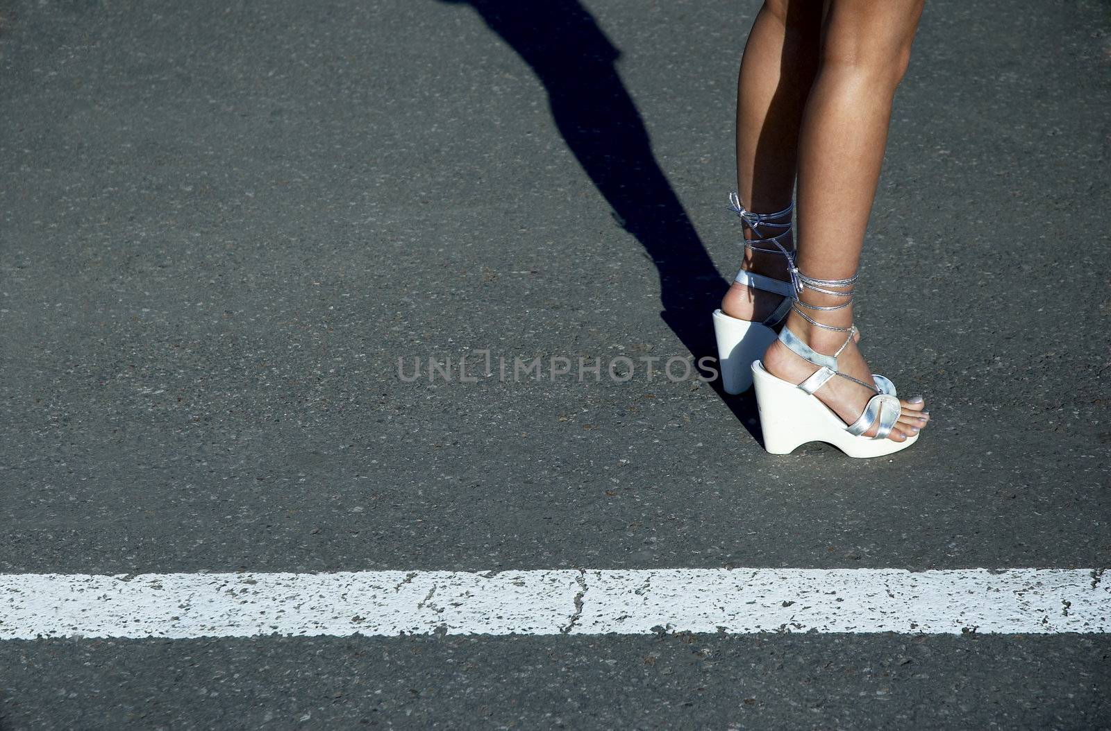 Sexy legs in sandals by Kuzma