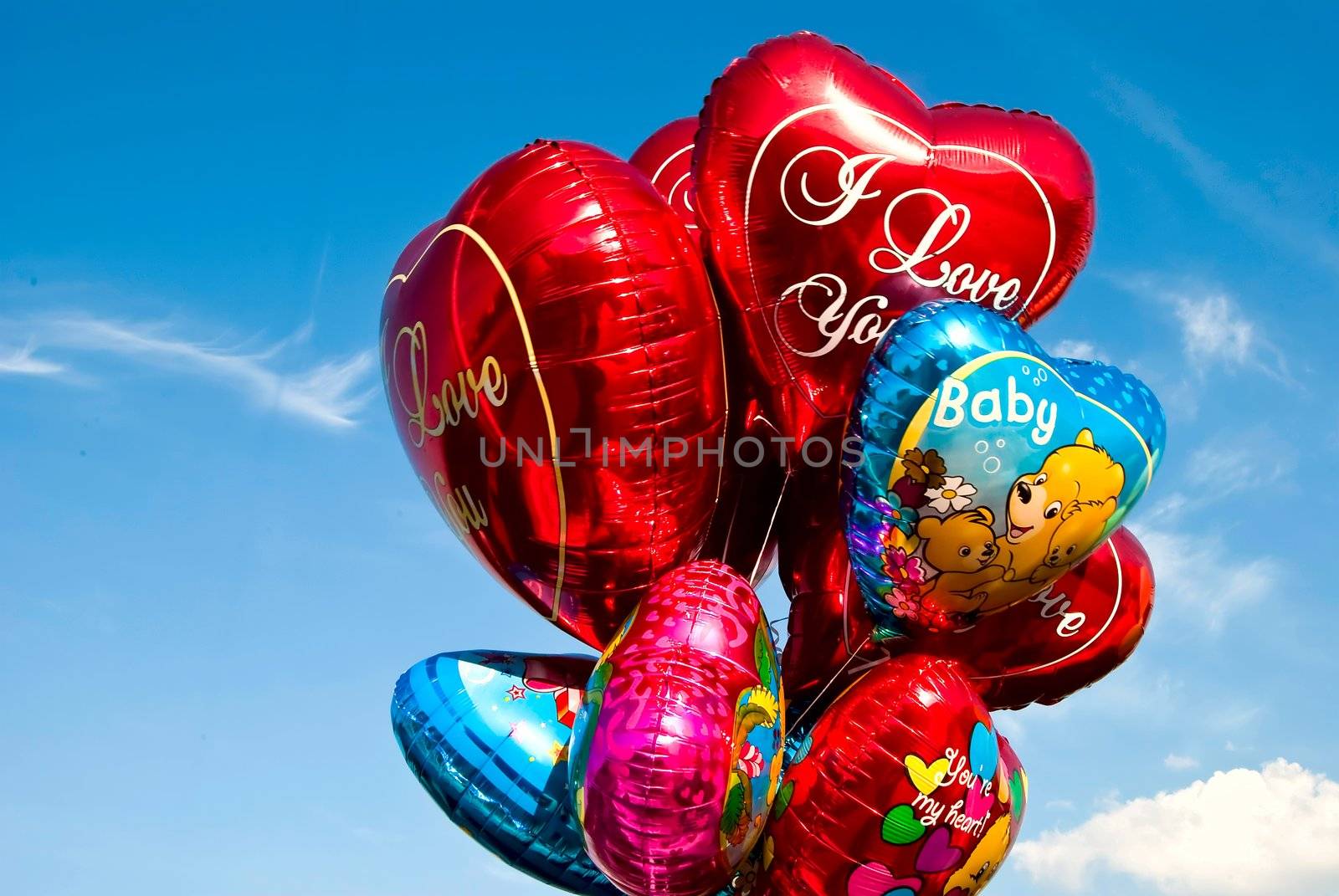 Colorful ballons with blue sky on background