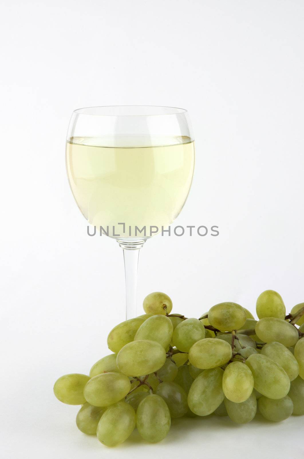 white wine and grapes by Kuzma