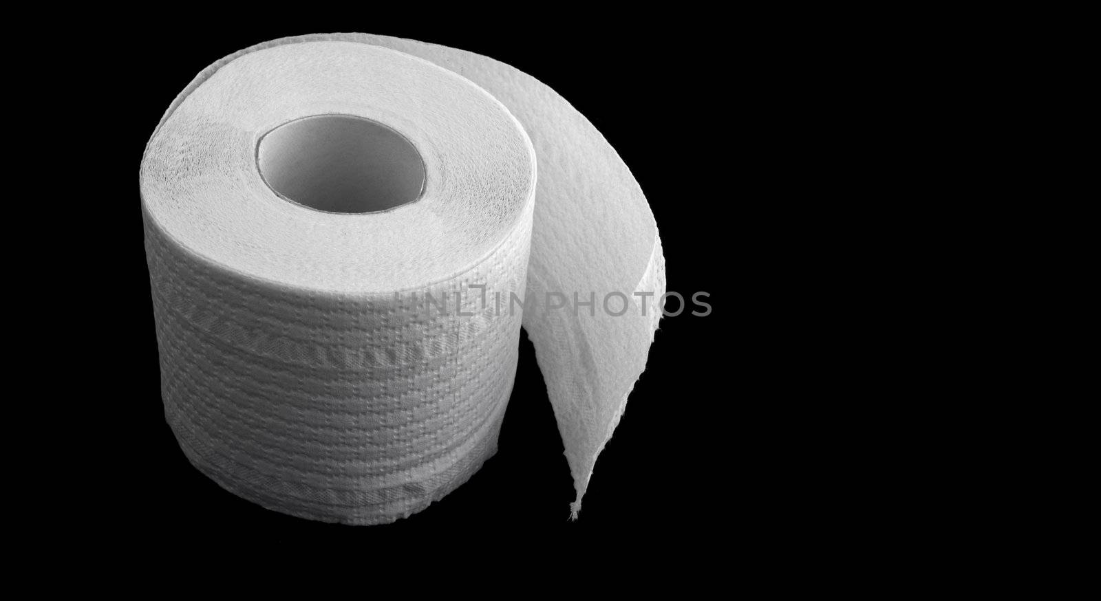 toilet paper on the black background by Kuzma