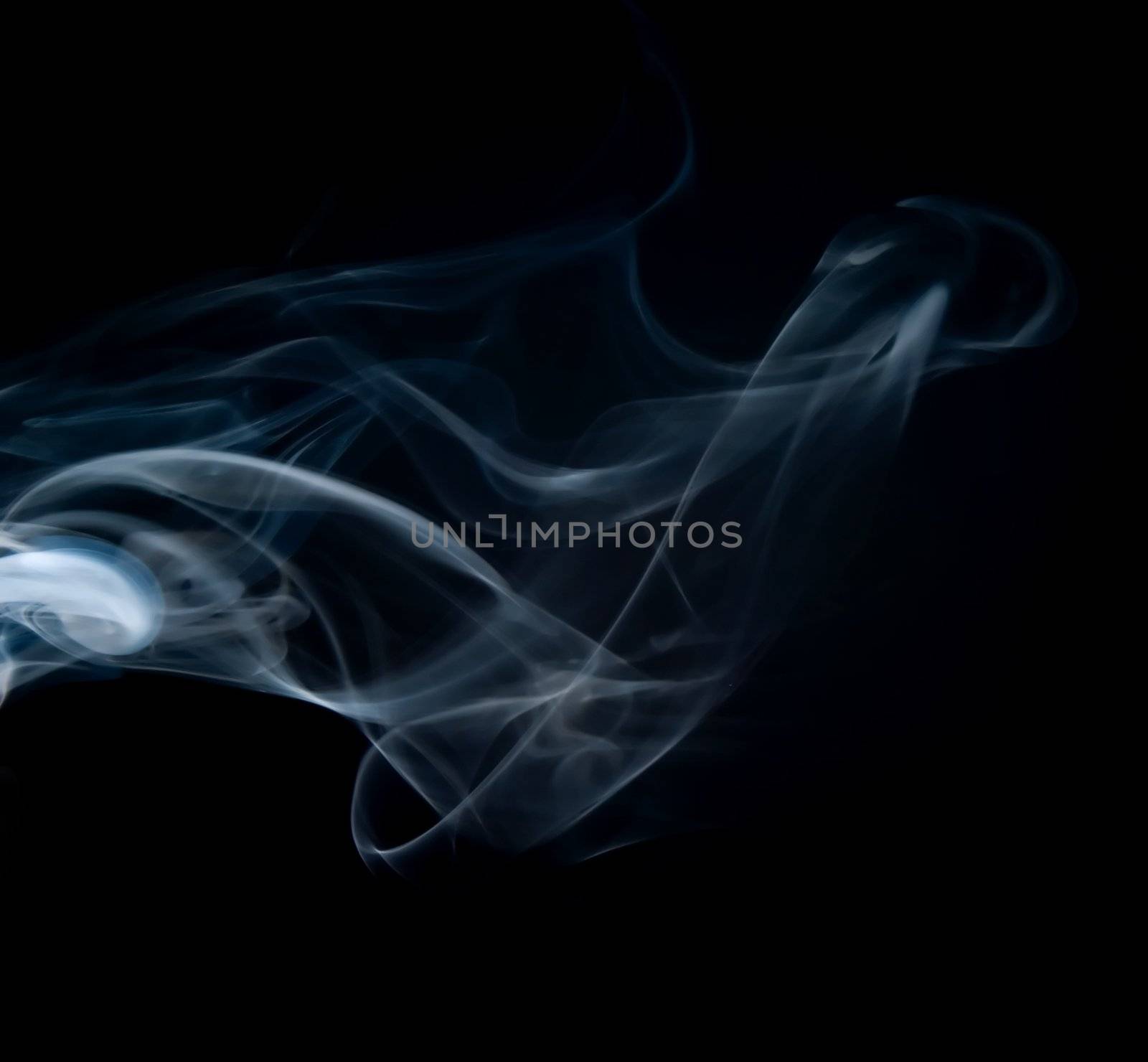 White smoke on a black background