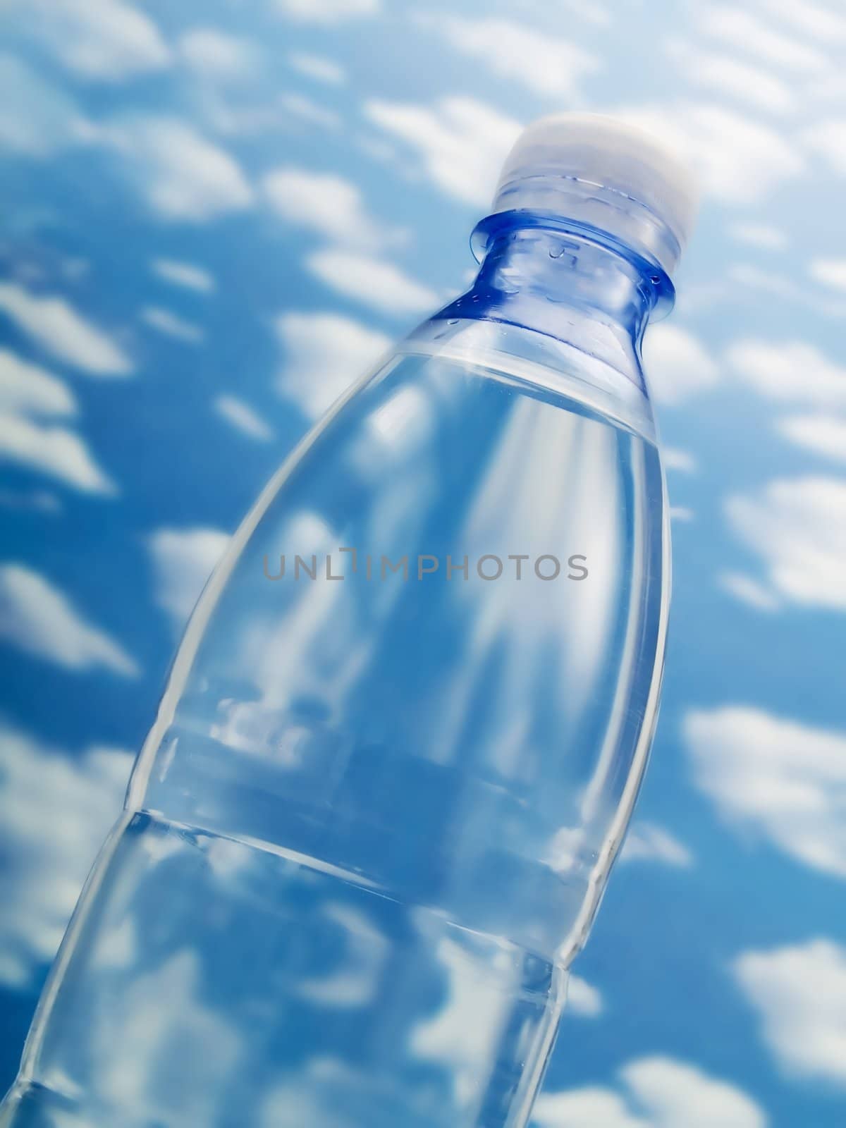 Bottle of water on a blue sky