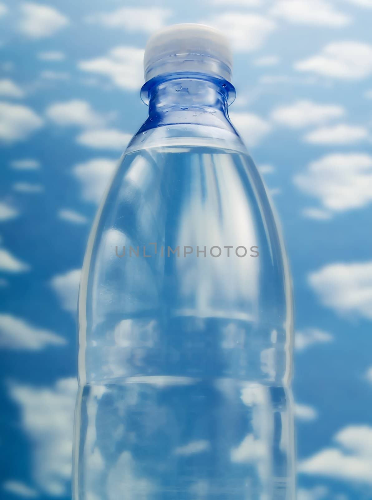 Bottle of water on a blue sky