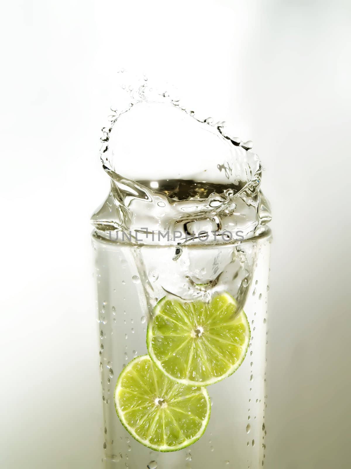Lime slices in a glass of water