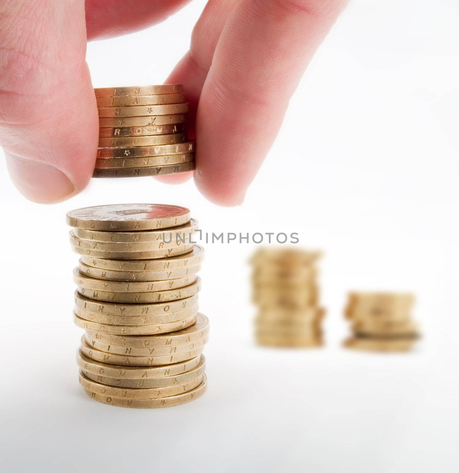 Pile of coins and hand