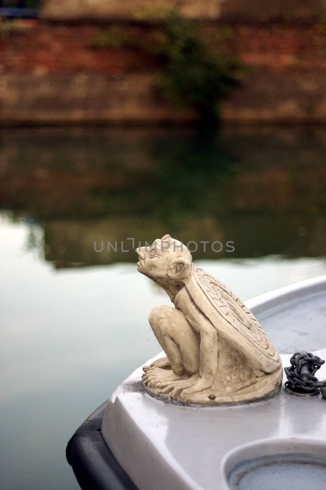 Gargoyle adorning front of boat