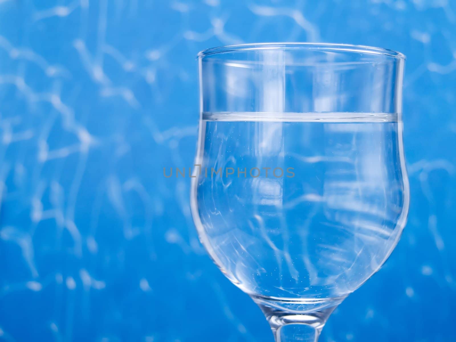 Glass of water by henrischmit