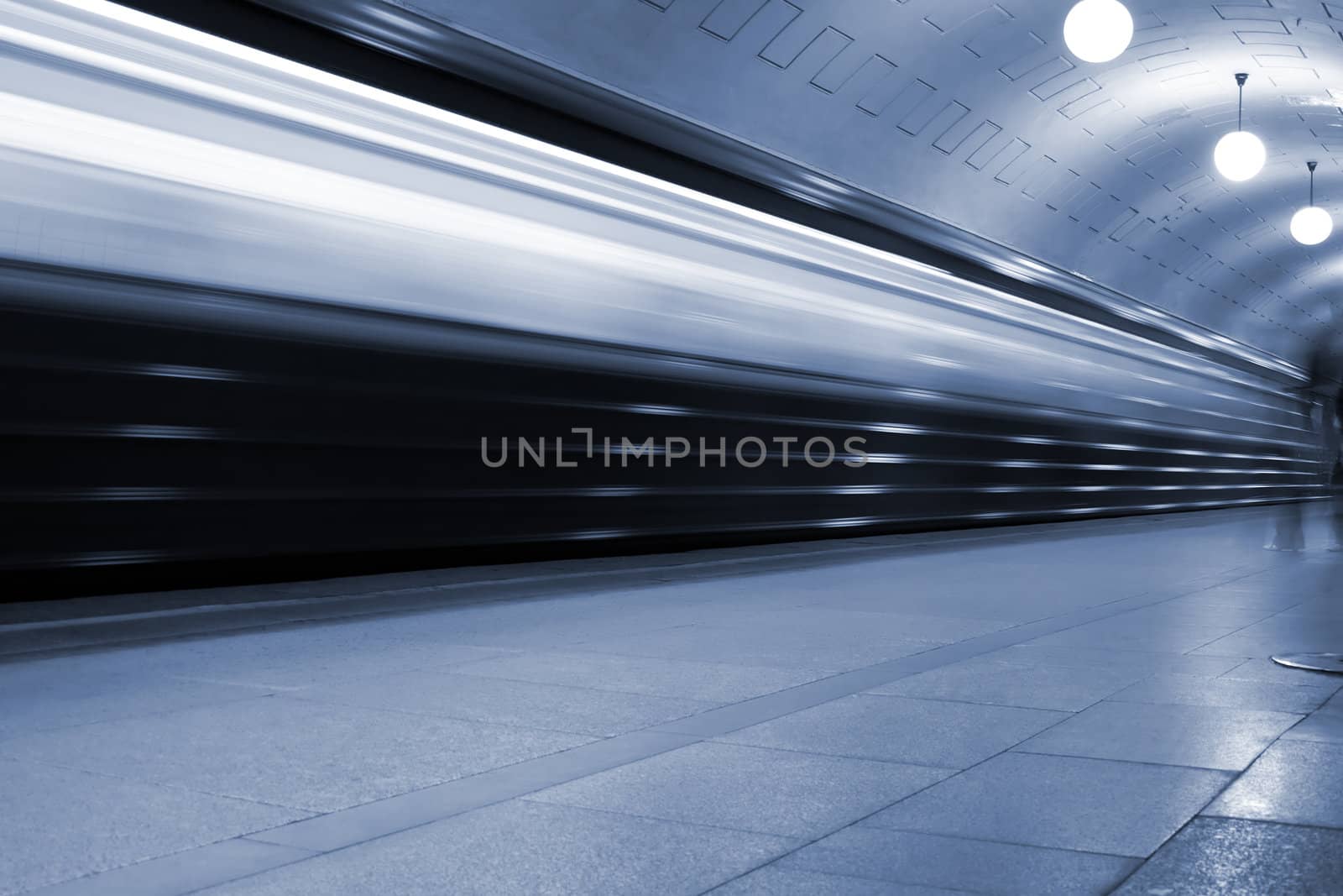 Subway. Underground station, motion blur. Tint blue