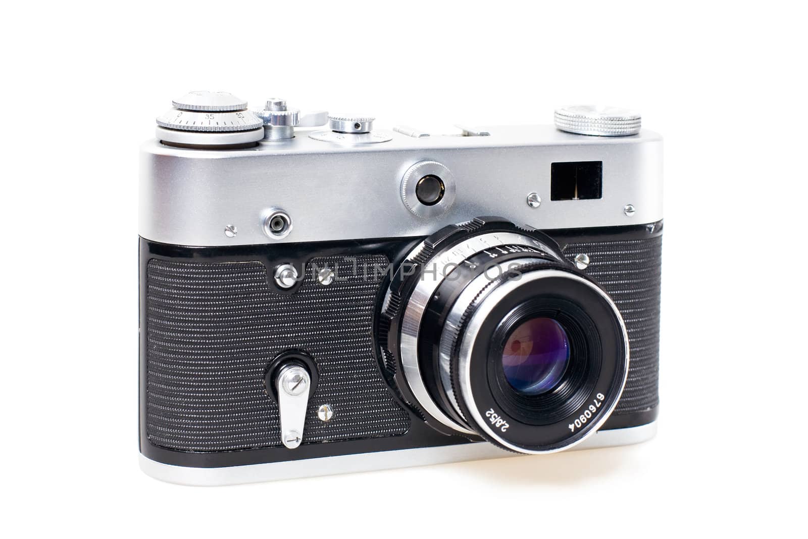 Old styled vintage mechanical 35mm film camera on white background
