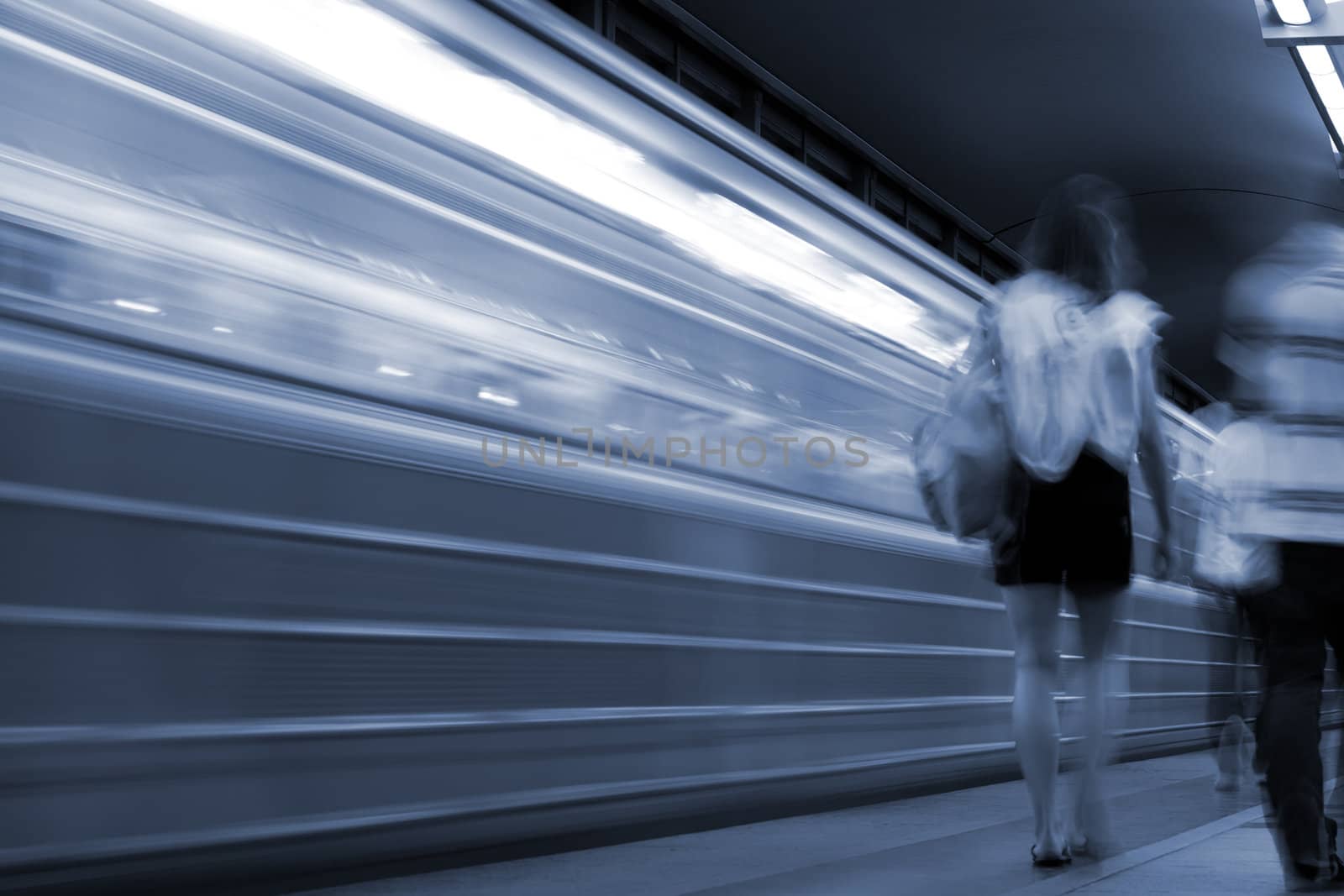 Subway. Underground station, motion blur. Tint blue