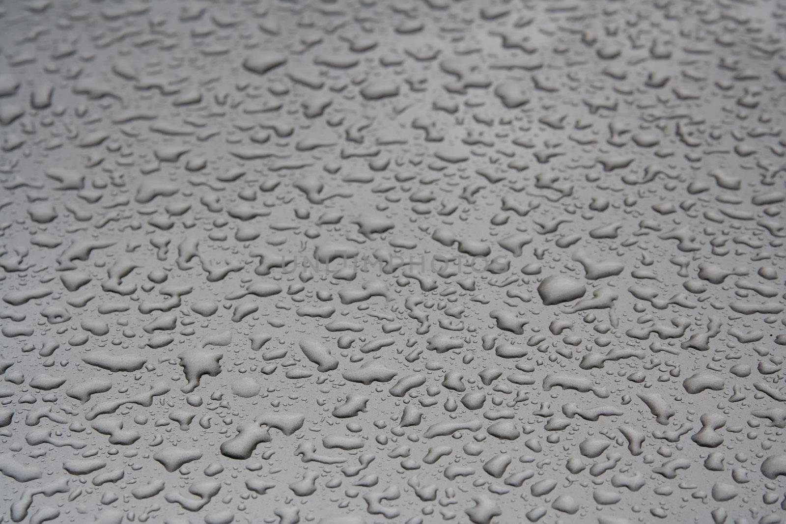 Water Droplets on a Steel Surface. Close-up