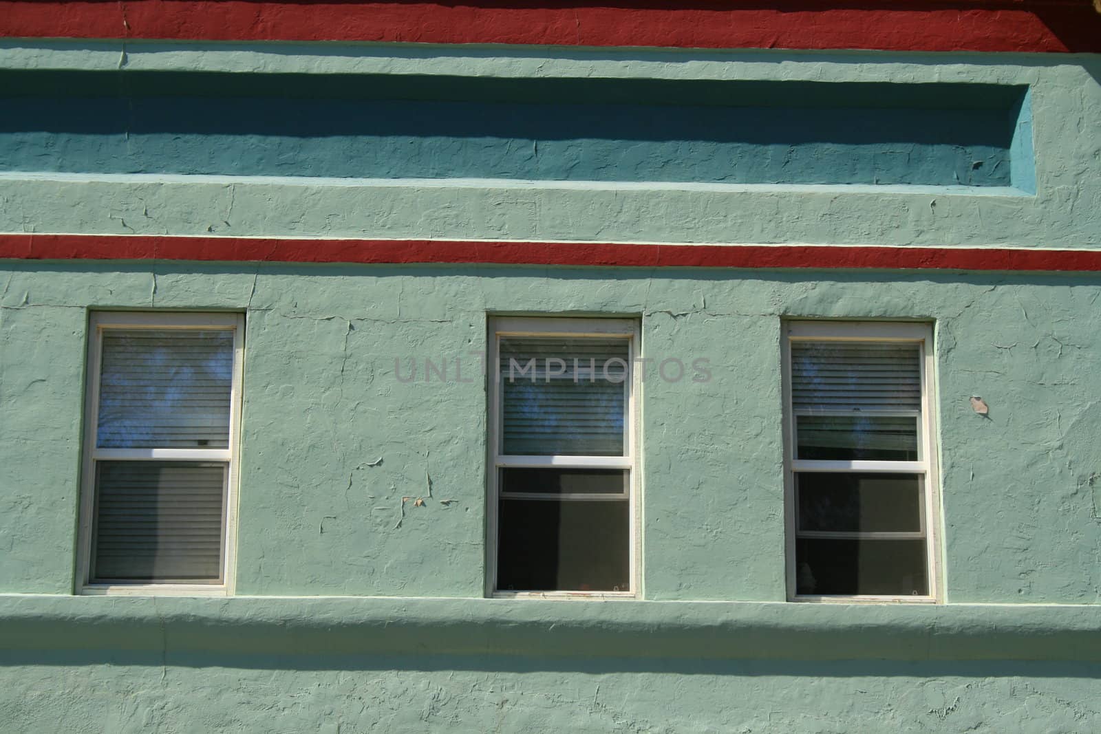 Close up of the windows of a building.
