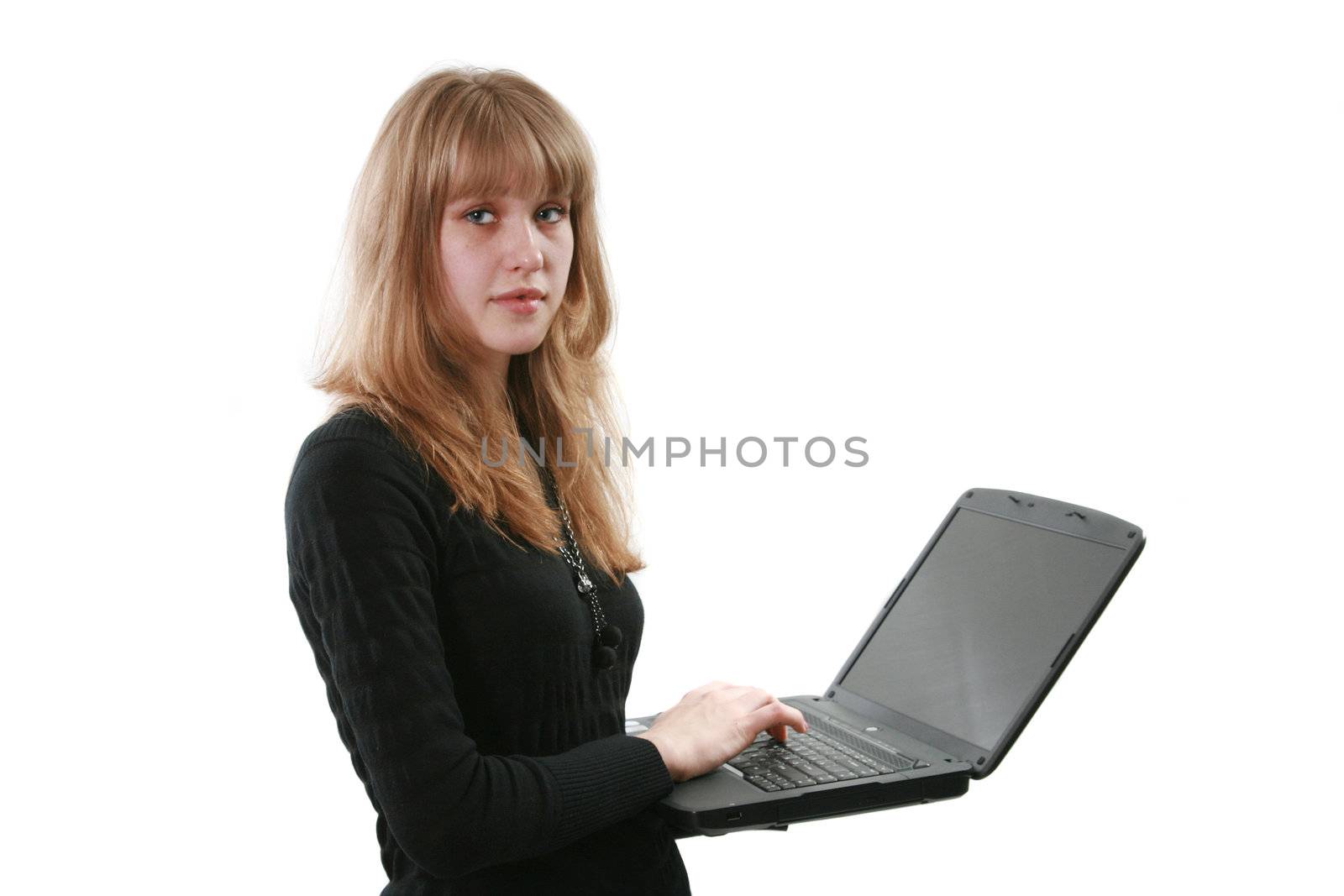 The young woman works with a computer